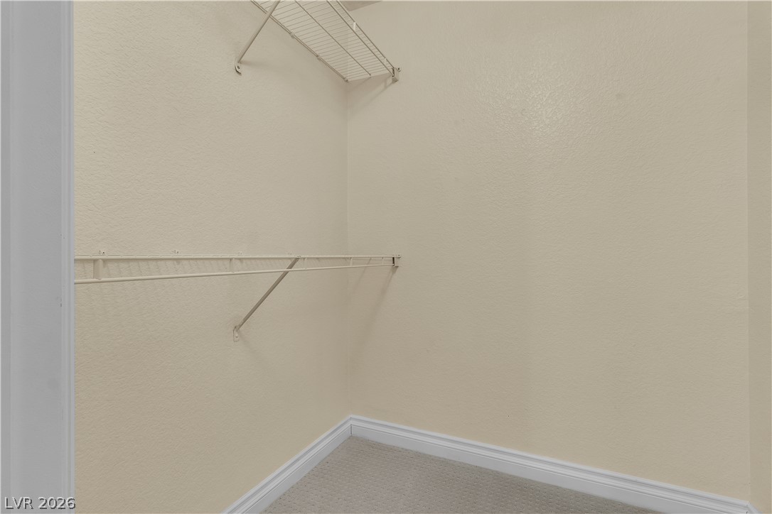 8101 West Flamingo Road, Unit 2001 Las Vegas, NV 89147 - Photo 12 of 28 Functional wire shelving optimizes this ample closet for organized storage.