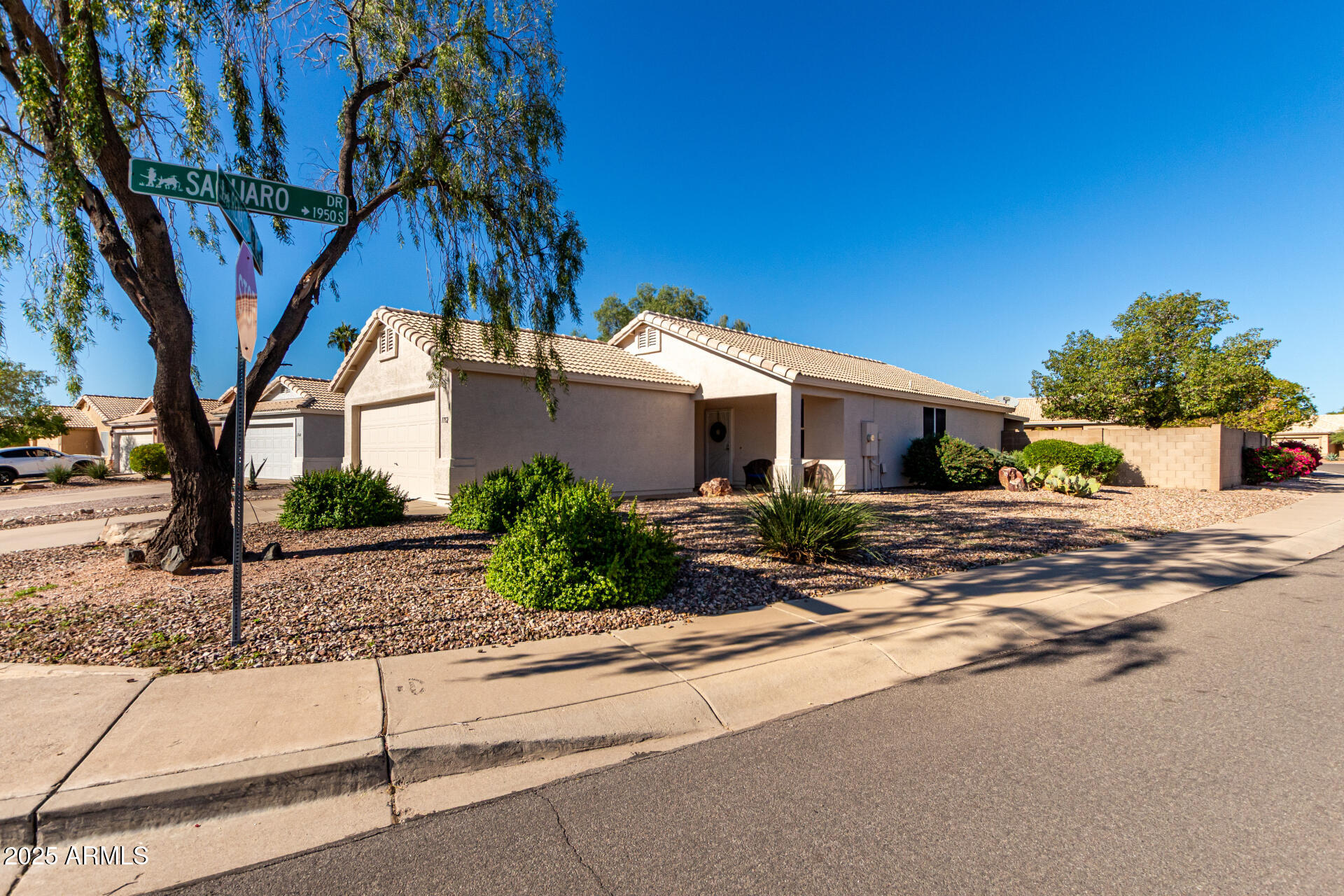 1752 West Renaissance Avenue Apache Junction, AZ 85120 - Photo 28 of 29 a view of a house with a street