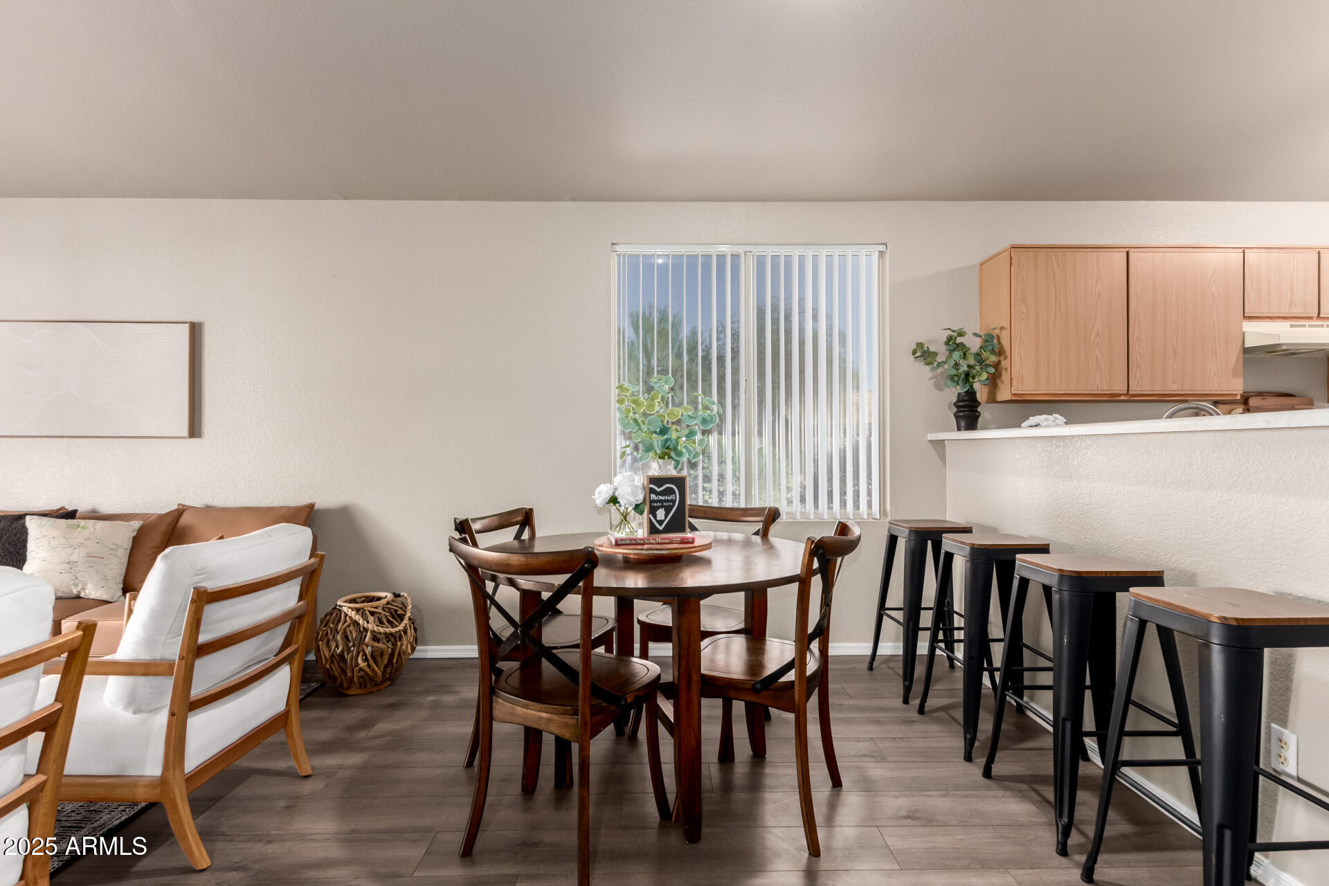 1752 West Renaissance Avenue Apache Junction, AZ 85120 - Photo 5 of 29 a view of a dining room with furniture and window
