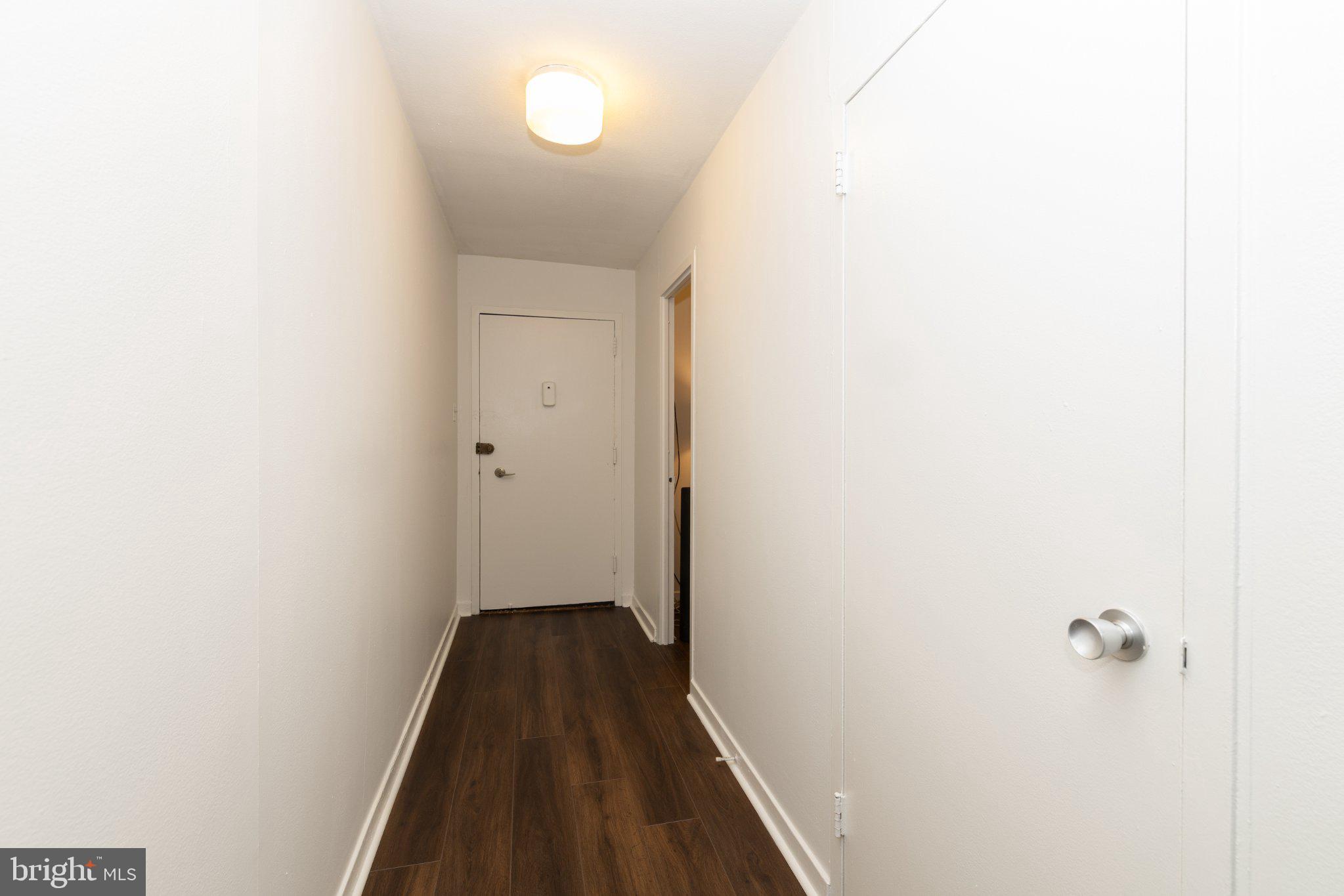 224 West Rittenhouse Square, Unit 1704 Philadelphia, PA 19103 - Photo 15 of 23 Bright and inviting hallway awaits you.