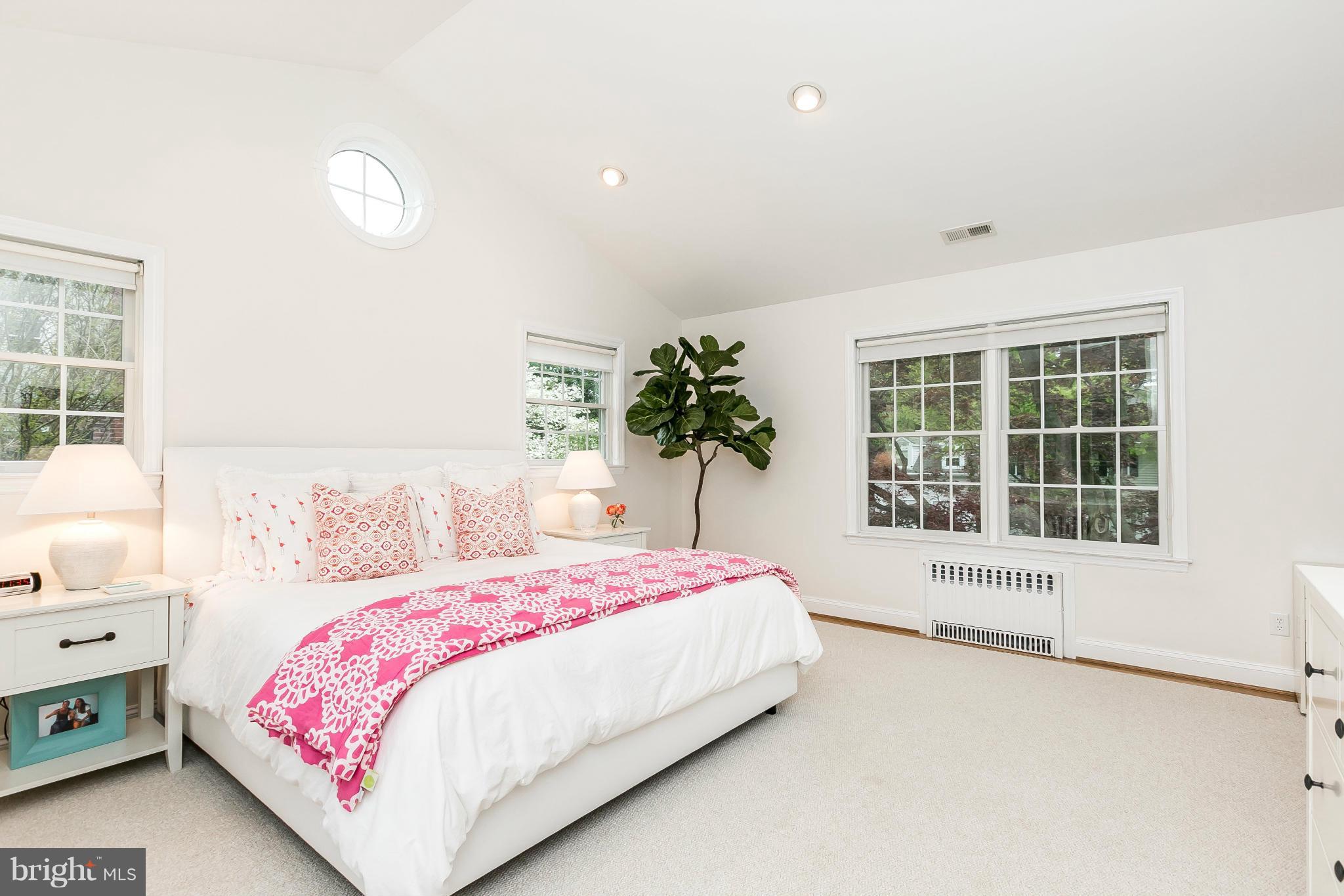 5700 Kenmore Road Baltimore, MD 21210 - Photo 17 of 30 a bedroom with a bed and a window
