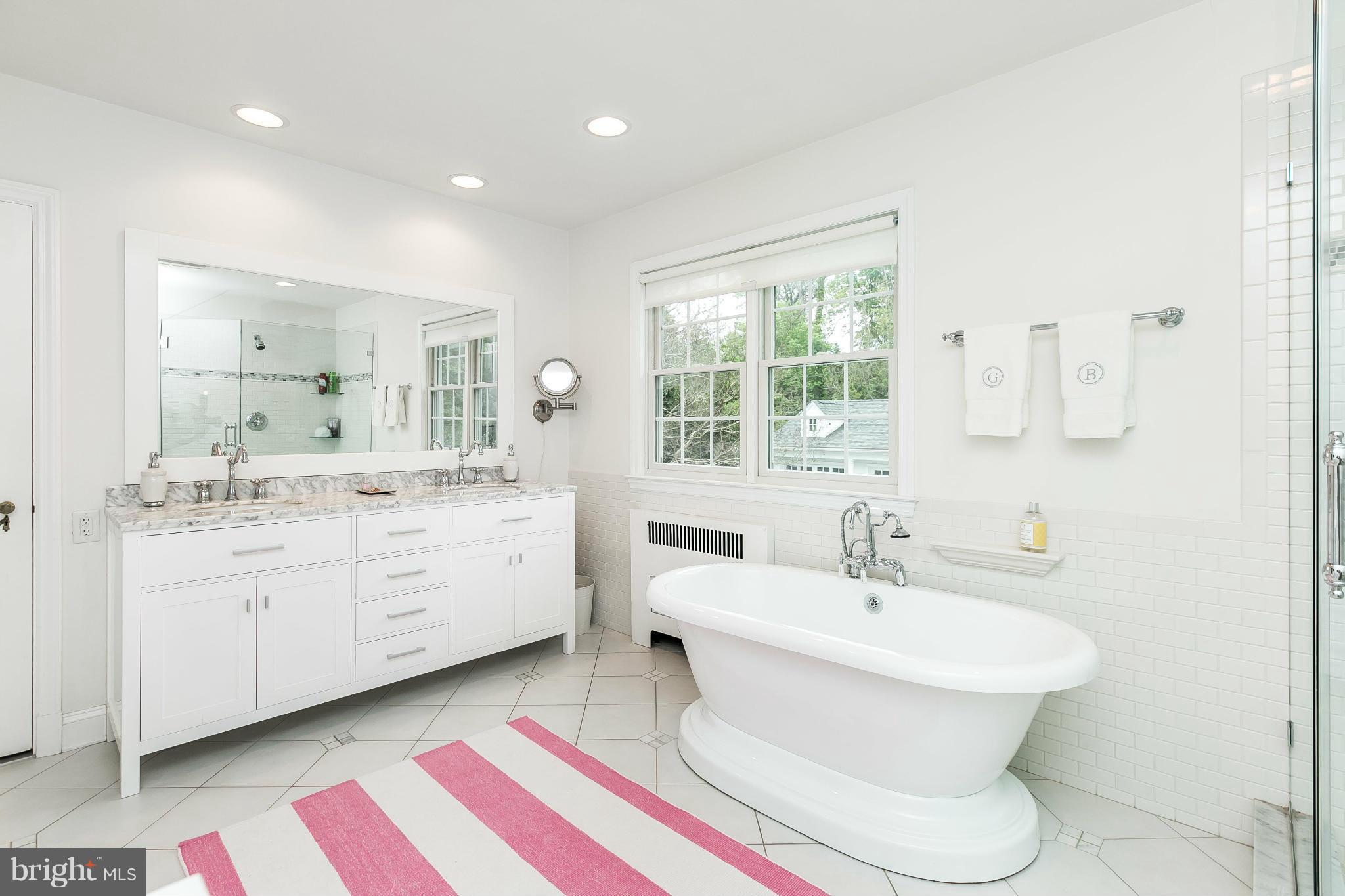 5700 Kenmore Road Baltimore, MD 21210 - Photo 20 of 30 a bathroom with a sink toilet and shower