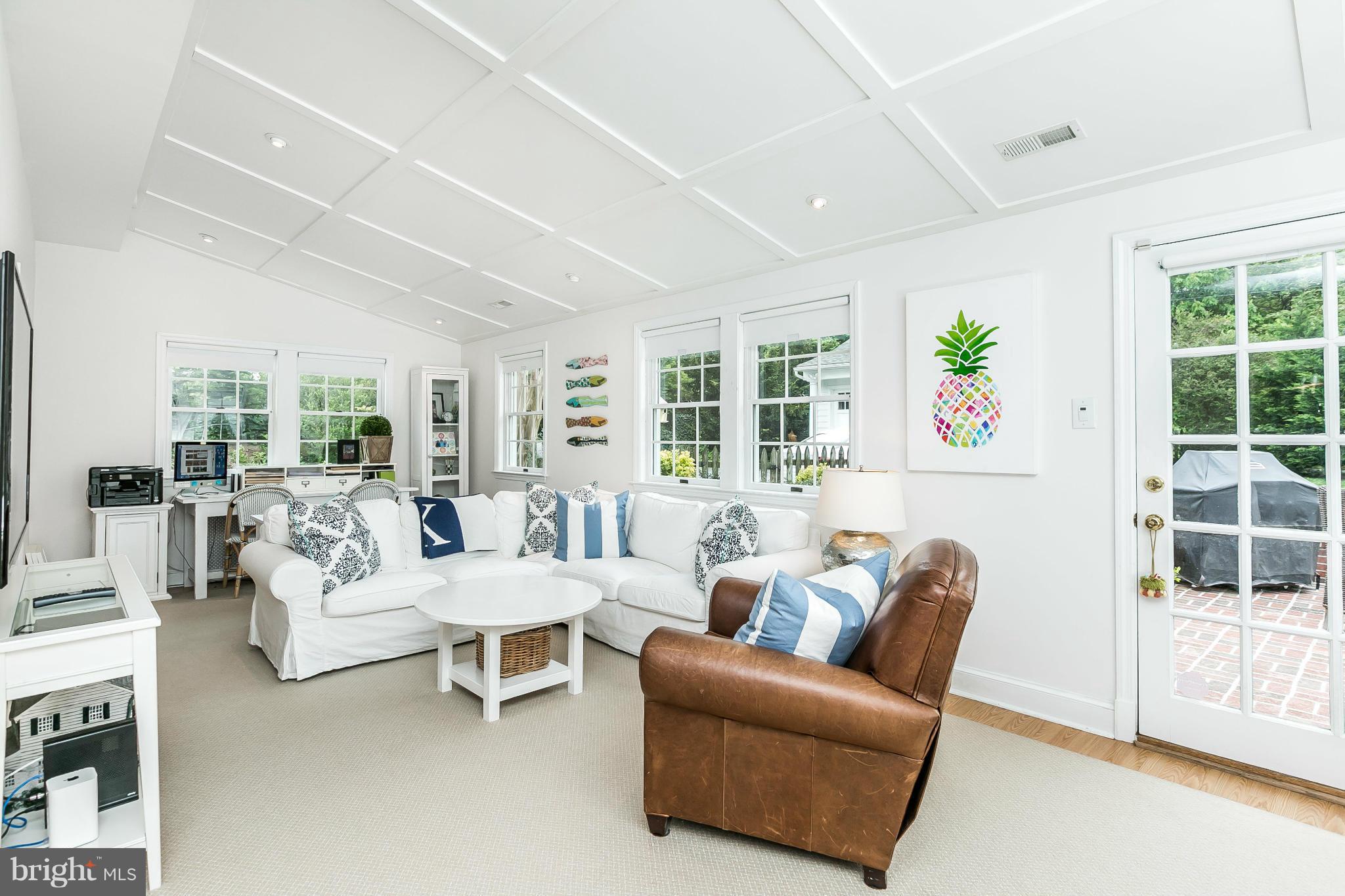5700 Kenmore Road Baltimore, MD 21210 - Photo 6 of 30 a living room with furniture and a large window