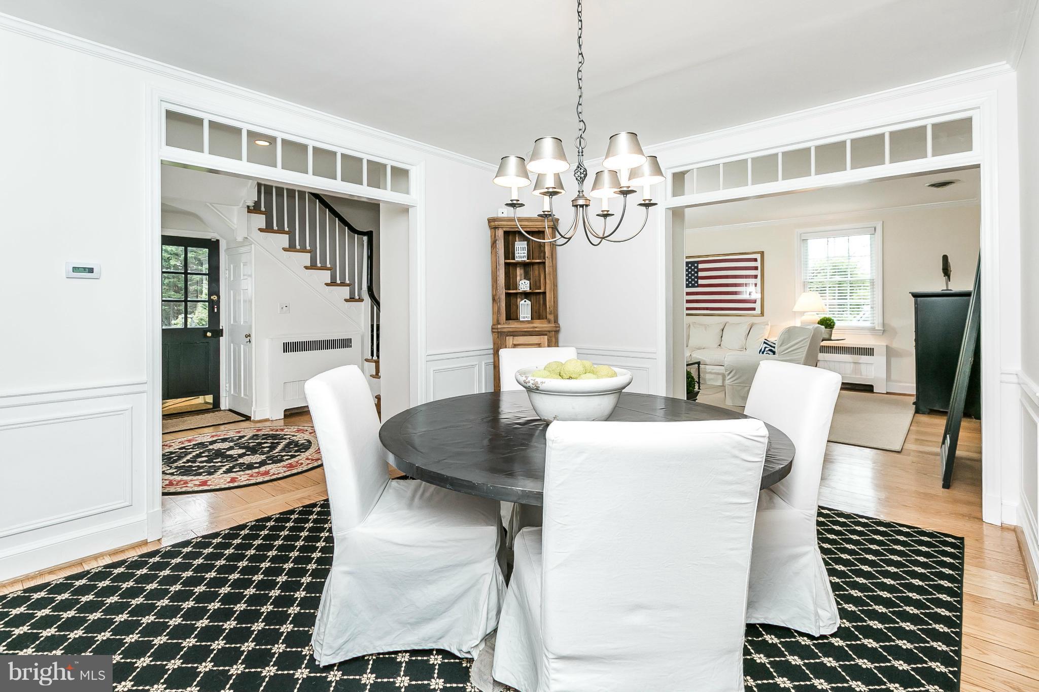 5700 Kenmore Road Baltimore, MD 21210 - Photo 8 of 30 a view of a dining room with furniture and chandelier