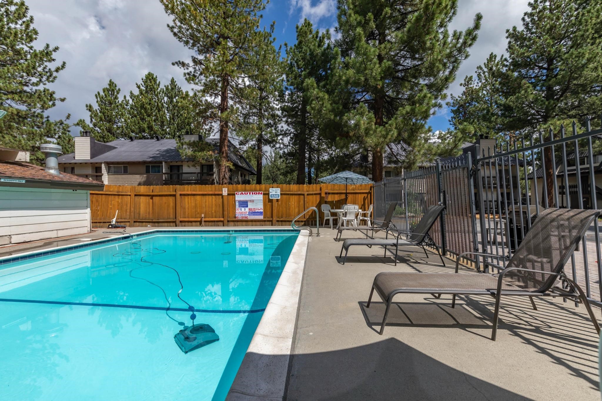 2289 Sierra Nevada Road, Unit G10 Mammoth Lakes, CA 93546 - Photo 20 of 23 Community pool featuring a patio