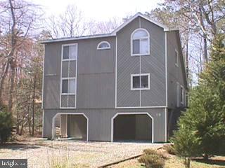 19 Rabbit Run Lane Ocean Pines, MD 21811 - Photo 1 of 4 a front view of a house with parking
