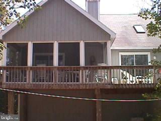 19 Rabbit Run Lane Ocean Pines, MD 21811 - Photo 2 of 4 a view of a house with a window