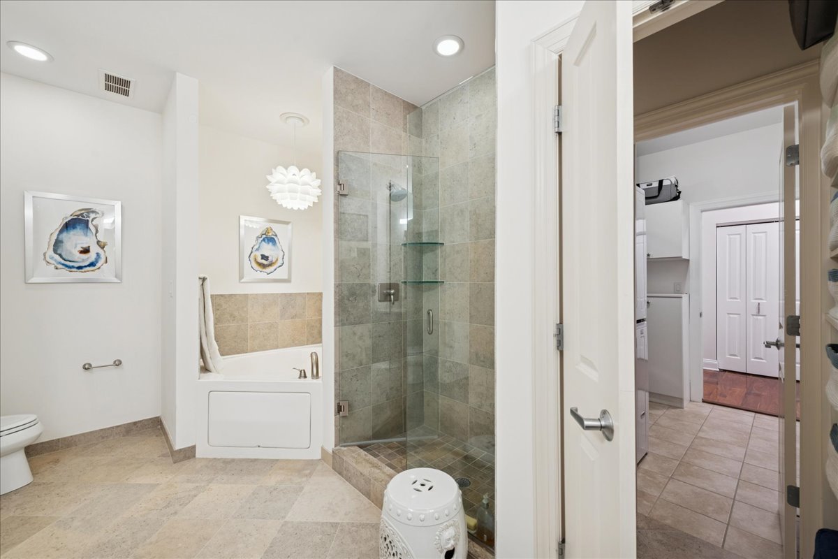 30 West Erie Street, Unit 601 Chicago, IL 60654 - Photo 20 of 30 a bathroom with a toilet sink and shower
