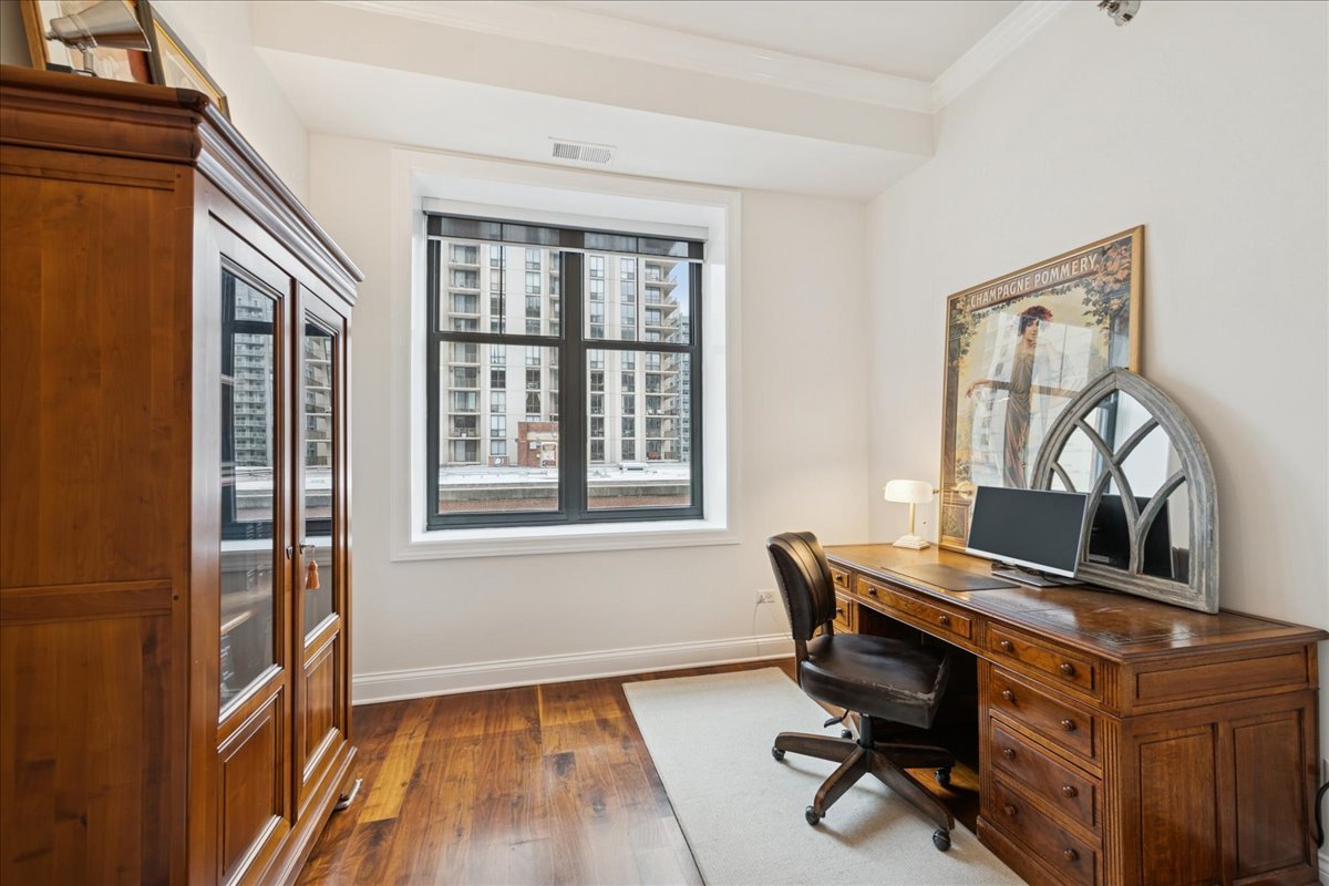 30 West Erie Street, Unit 601 Chicago, IL 60654 - Photo 24 of 30 a view of a workspace with furniture and a window