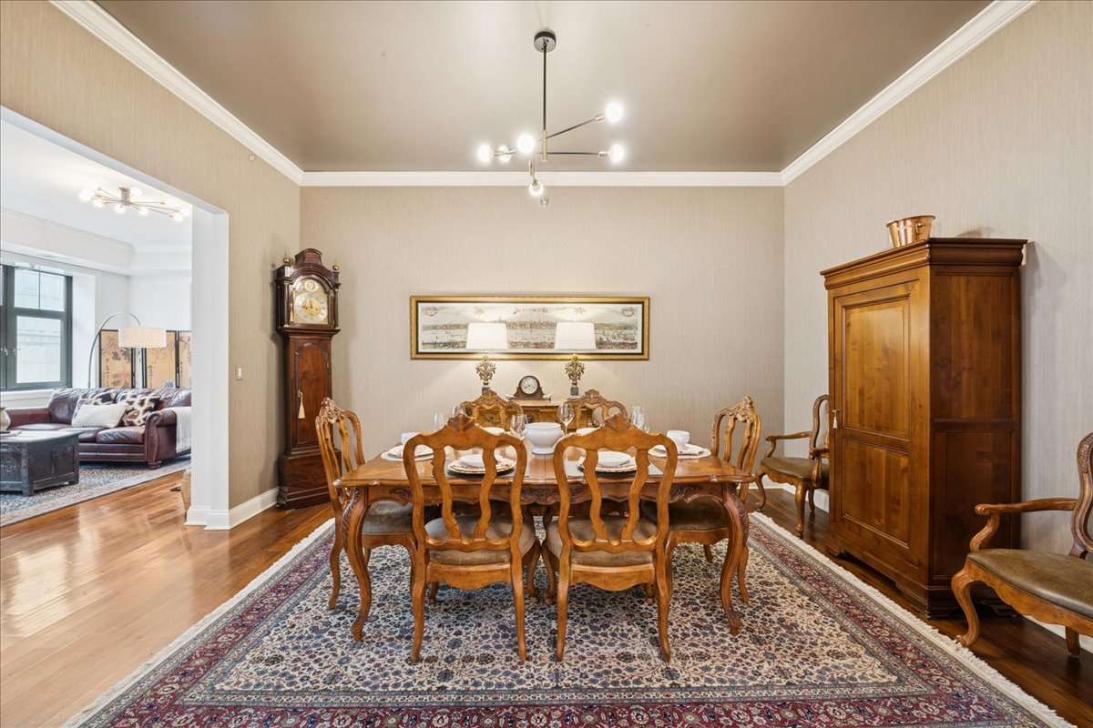 30 West Erie Street, Unit 601 Chicago, IL 60654 - Photo 9 of 30 a view of a dining room with furniture