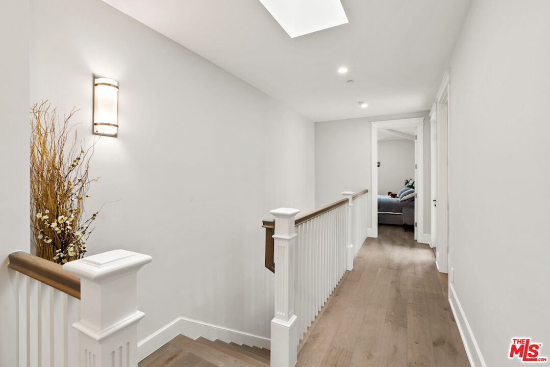 592 30th Street Manhattan Beach, CA 90266 - Photo 33 of 57 a view of a hallway with workspace