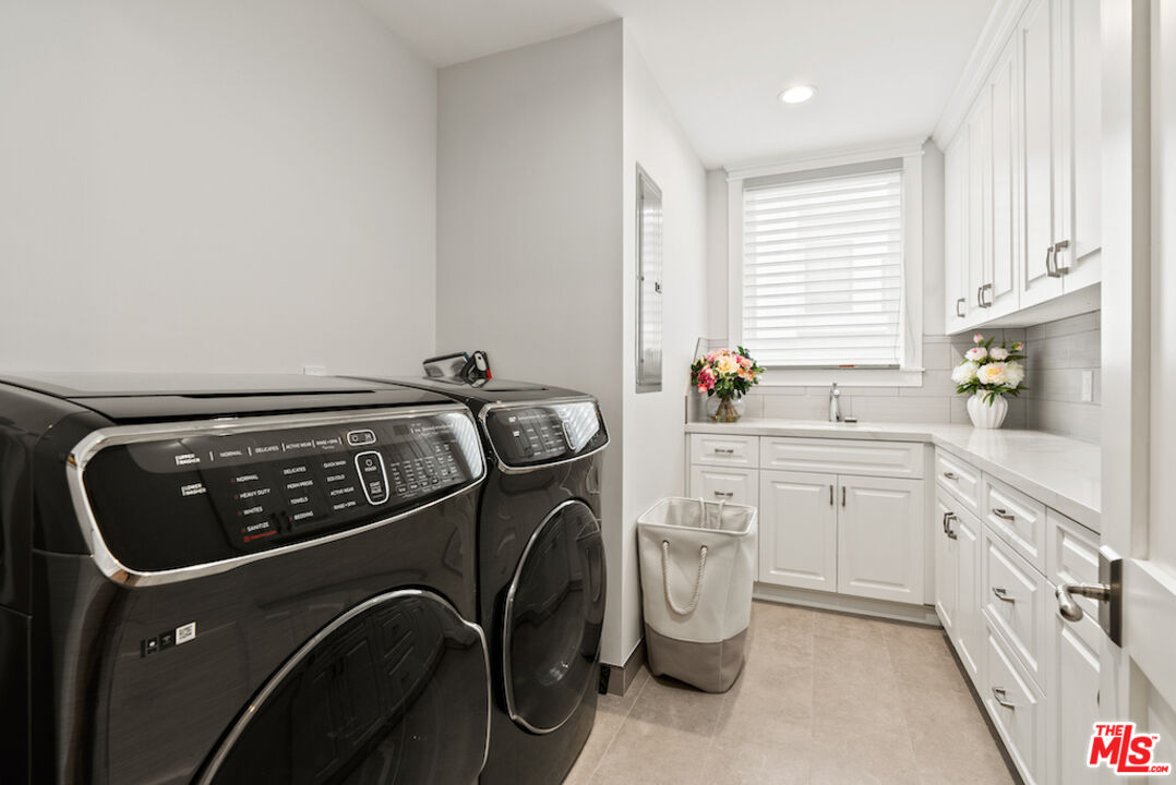 592 30th Street Manhattan Beach, CA 90266 - Photo 54 of 57 a utility room with dryer and washer