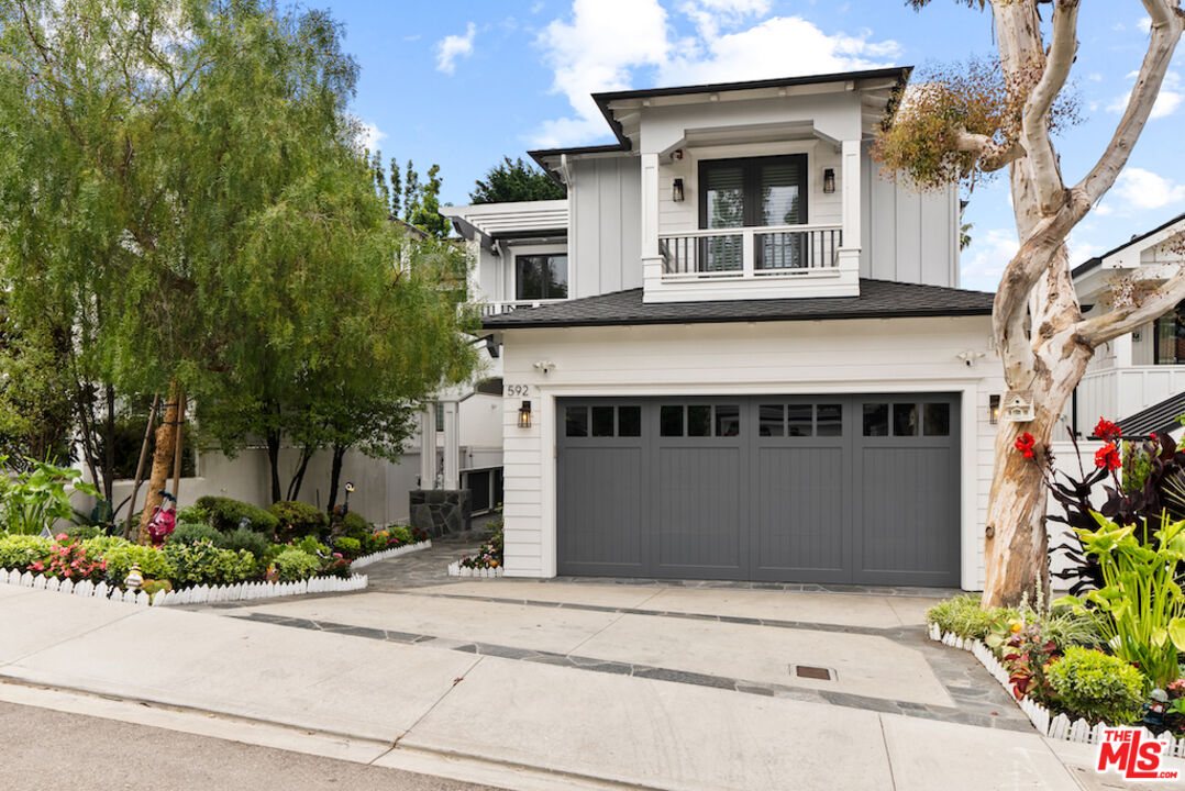592 30th Street Manhattan Beach, CA 90266 - Photo 57 of 57 a front view of a house with a garage