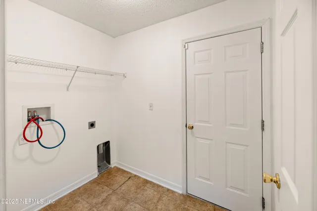 a view of a room with rack on the wall