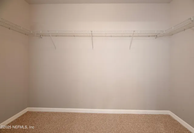 a view of small space with racks on the wall