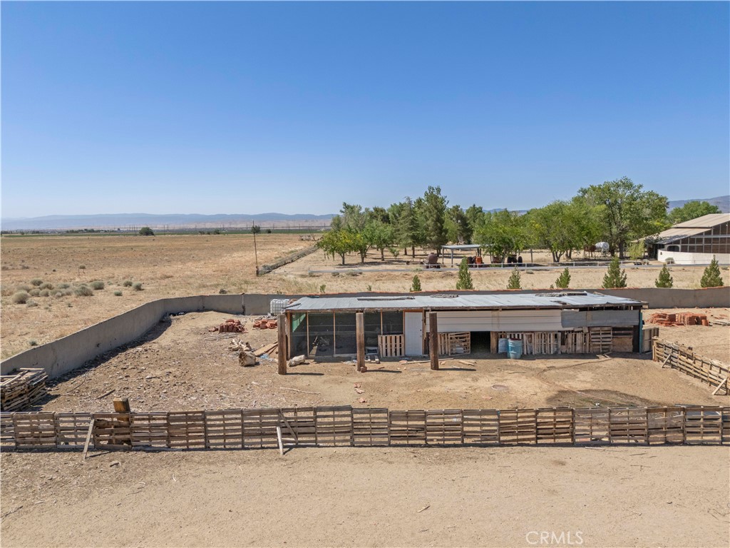 15374 Gaskell Road Rosamond, CA 93560 - Photo 13 of 74 a view of a building with a ocean view