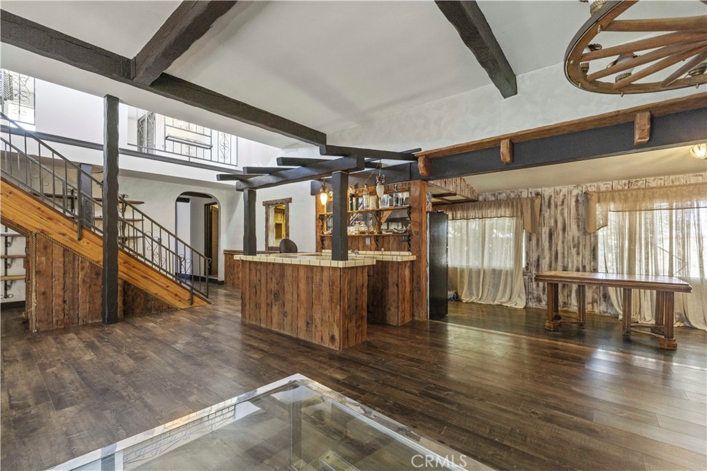 15374 Gaskell Road Rosamond, CA 93560 - Photo 44 of 74 a view of an entryway with wooden floor