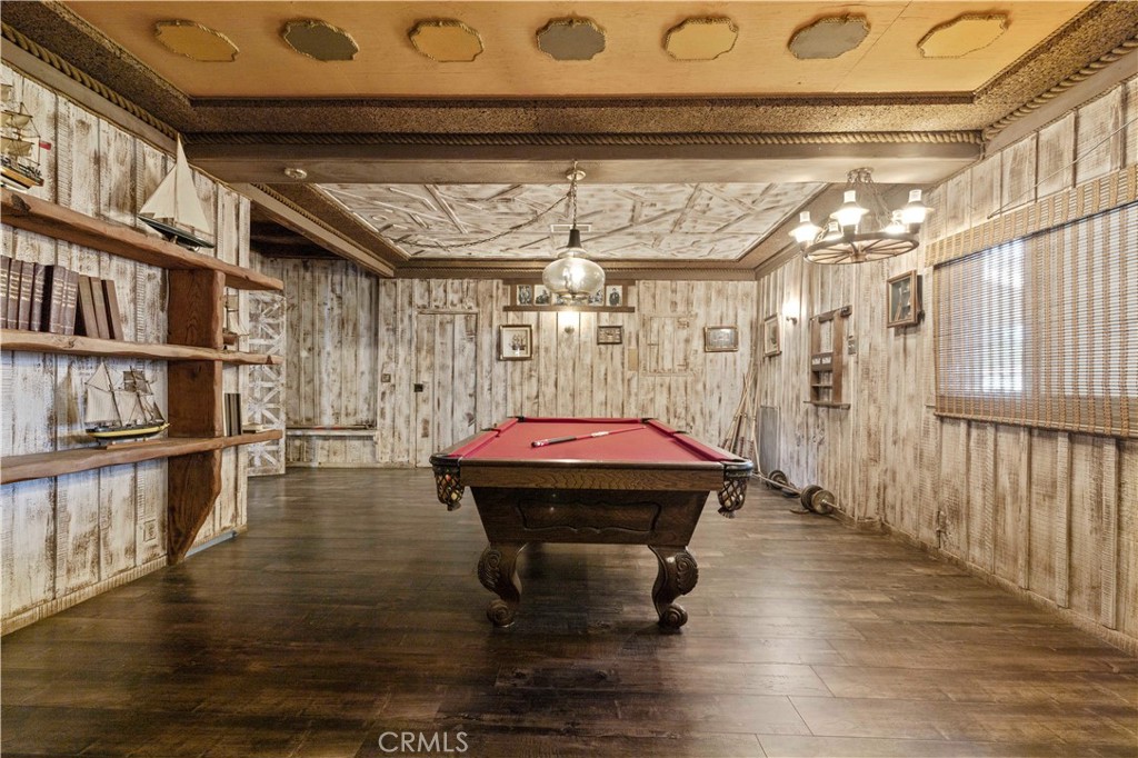 15374 Gaskell Road Rosamond, CA 93560 - Photo 46 of 74 a room with lots of wooden furniture and a window