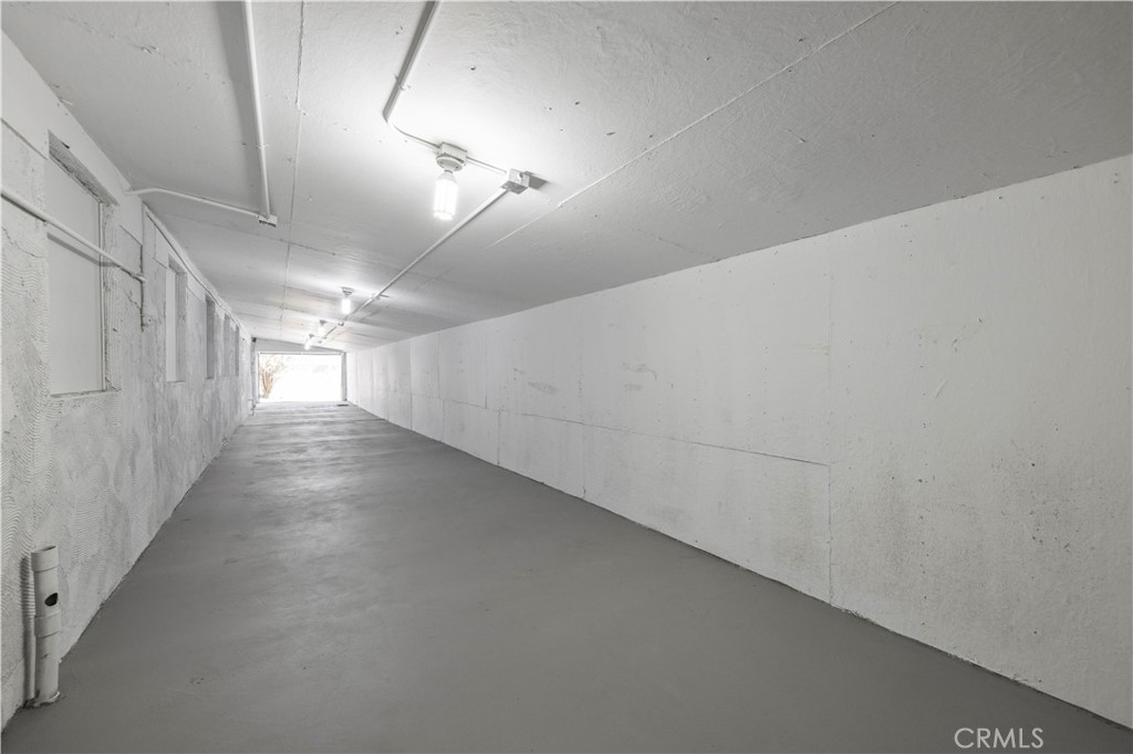 15374 Gaskell Road Rosamond, CA 93560 - Photo 57 of 74 a view of a hallway with stairs