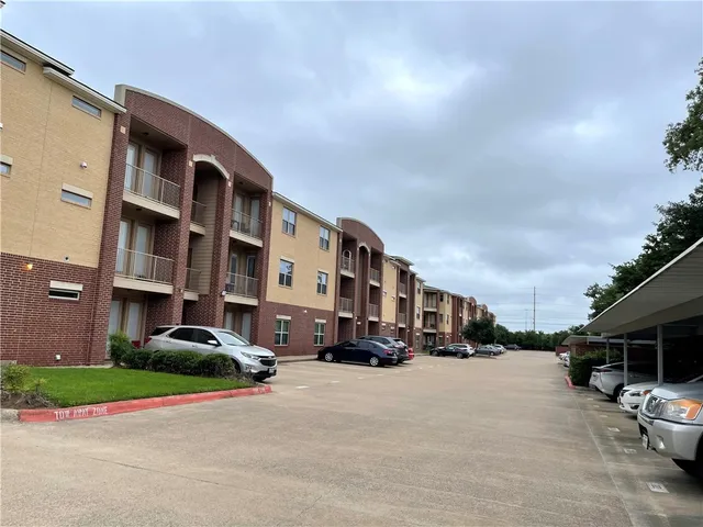 a view of kitchen with cabinets and wooden floor