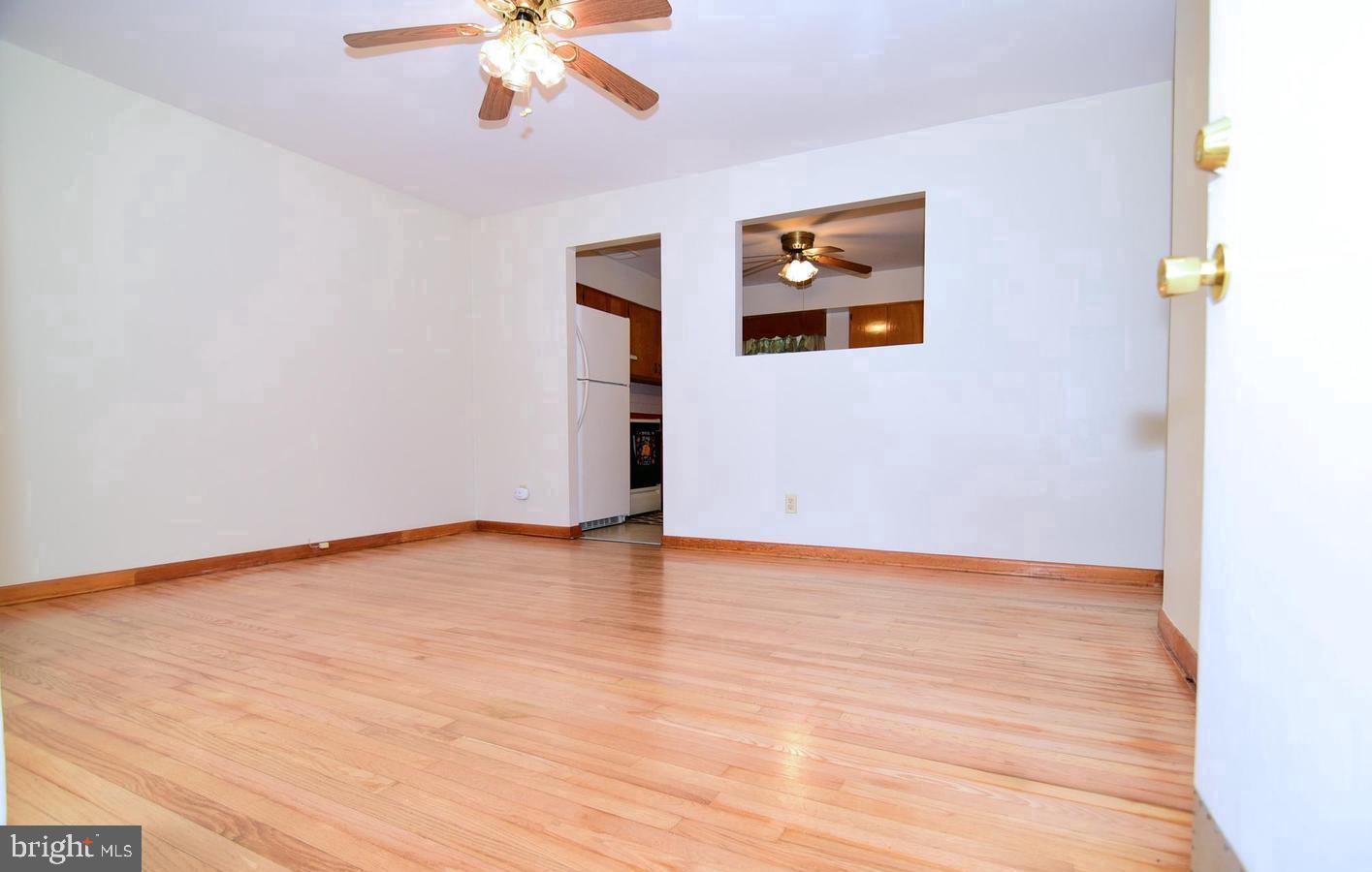 5210 Colebrook Drive La Plata, MD 20646 - Photo 18 of 27 a view of an empty room with wooden floor