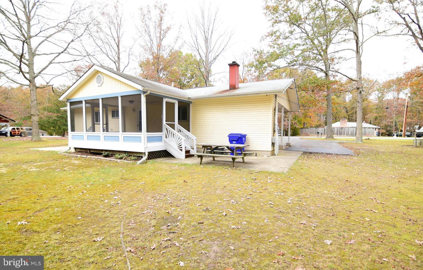 5210 Colebrook Drive La Plata, MD 20646 - Photo 21 of 27 a view of a house with swimming pool and sitting area