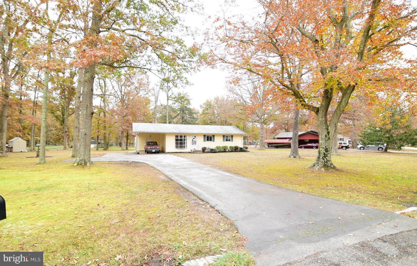 5210 Colebrook Drive La Plata, MD 20646 - Photo 24 of 27 a swimming pool with trees in front of it