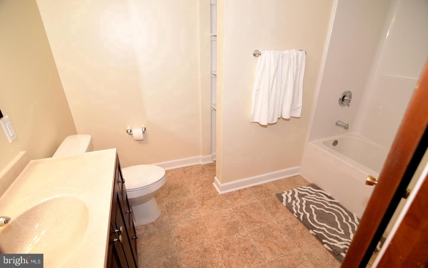 5210 Colebrook Drive La Plata, MD 20646 - Photo 8 of 27 a bathroom with a bathtub and a shower