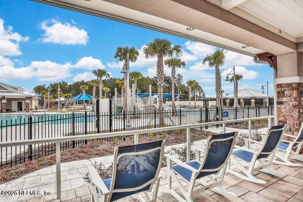 213 Silver Myrtle Court St. Augustine, FL 32092 - Photo 20 of 25 a view of a balcony with furniture