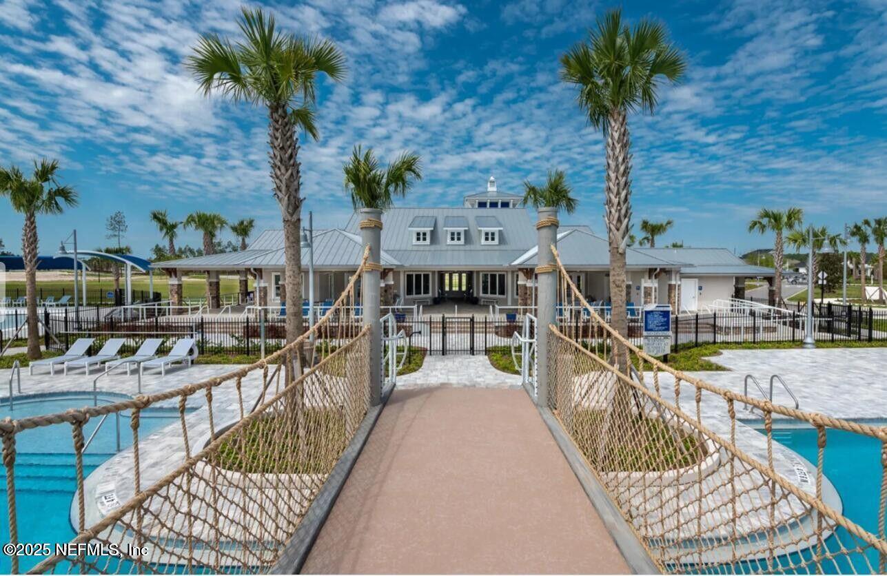 213 Silver Myrtle Court St. Augustine, FL 32092 - Photo 22 of 25 a view of a house with a patio