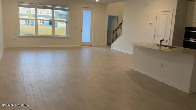 a kitchen with a cabinets and appliances