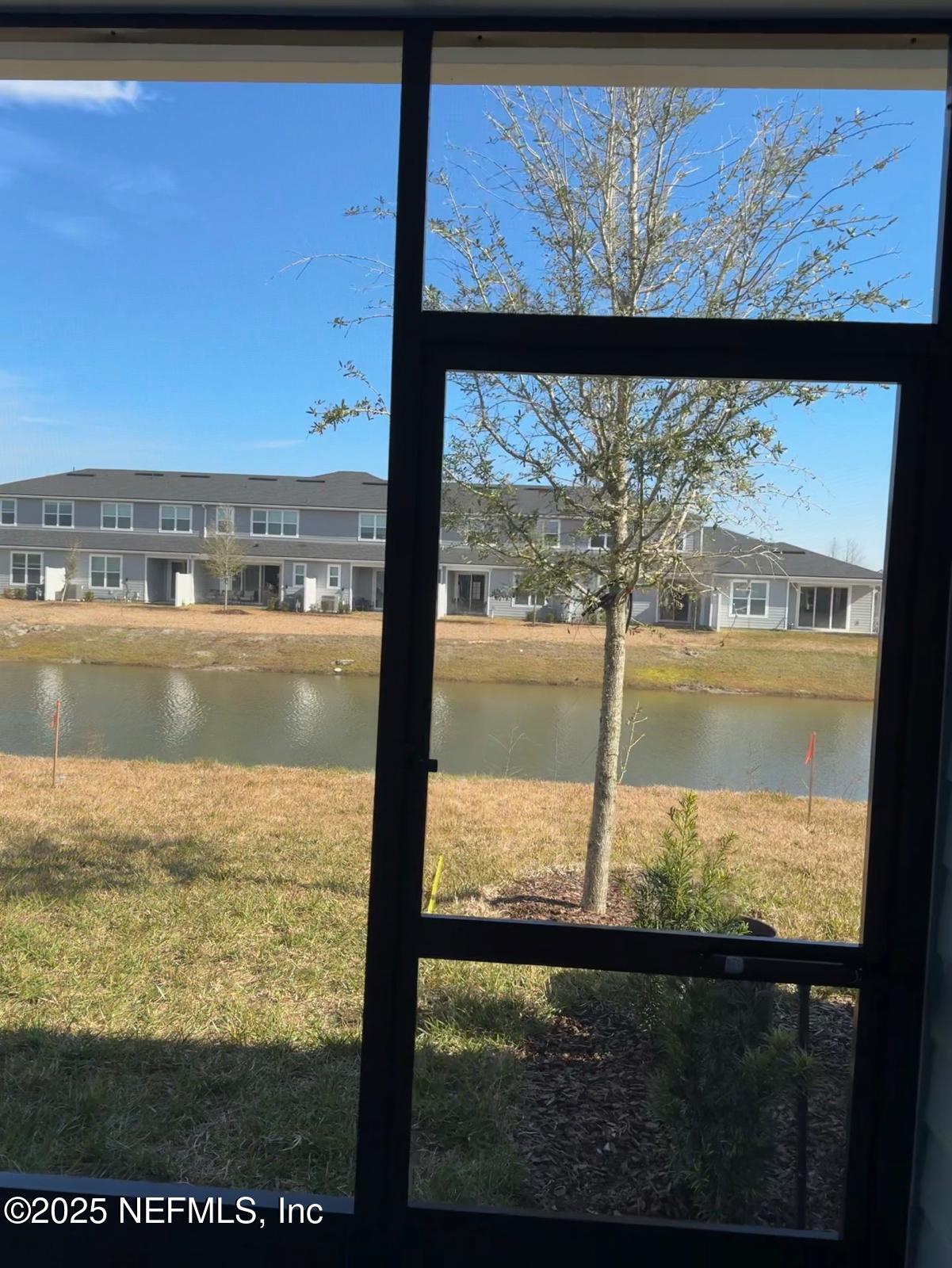 213 Silver Myrtle Court St. Augustine, FL 32092 - Photo 8 of 25 a view of an ocean from a window