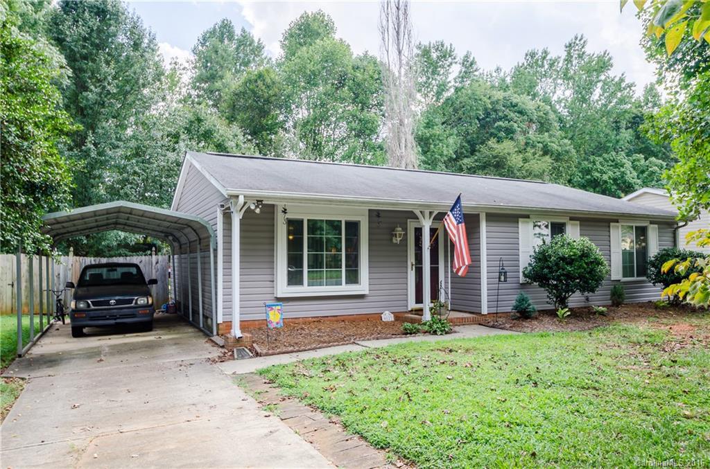 4823 Smokehollow Road Charlotte, NC 28227 - Photo 2 of 19 a view of house in front of a yard with potted plants