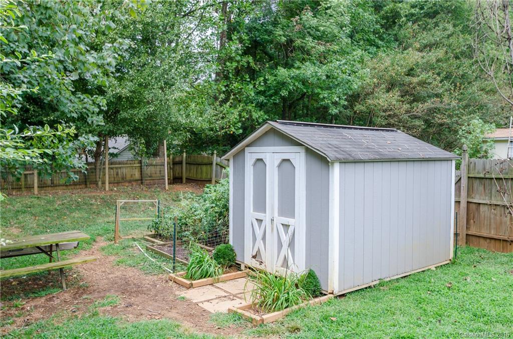4823 Smokehollow Road Charlotte, NC 28227 - Photo 18 of 19 a view of a house with backyard and garden