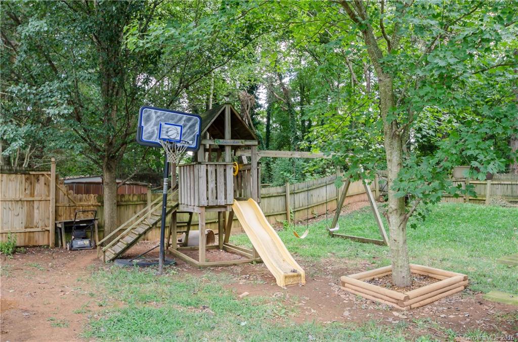 4823 Smokehollow Road Charlotte, NC 28227 - Photo 19 of 19 a view of a park with slide