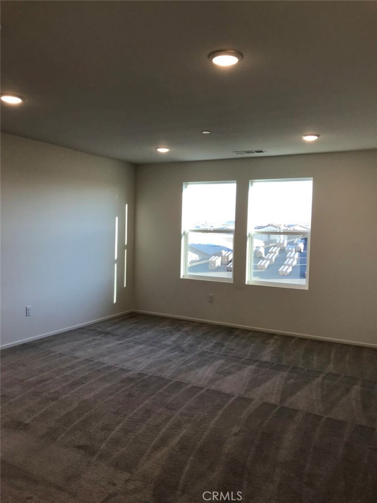 16031 Cordova Road Victorville, CA 92394 - Photo 24 of 34 an empty room with windows