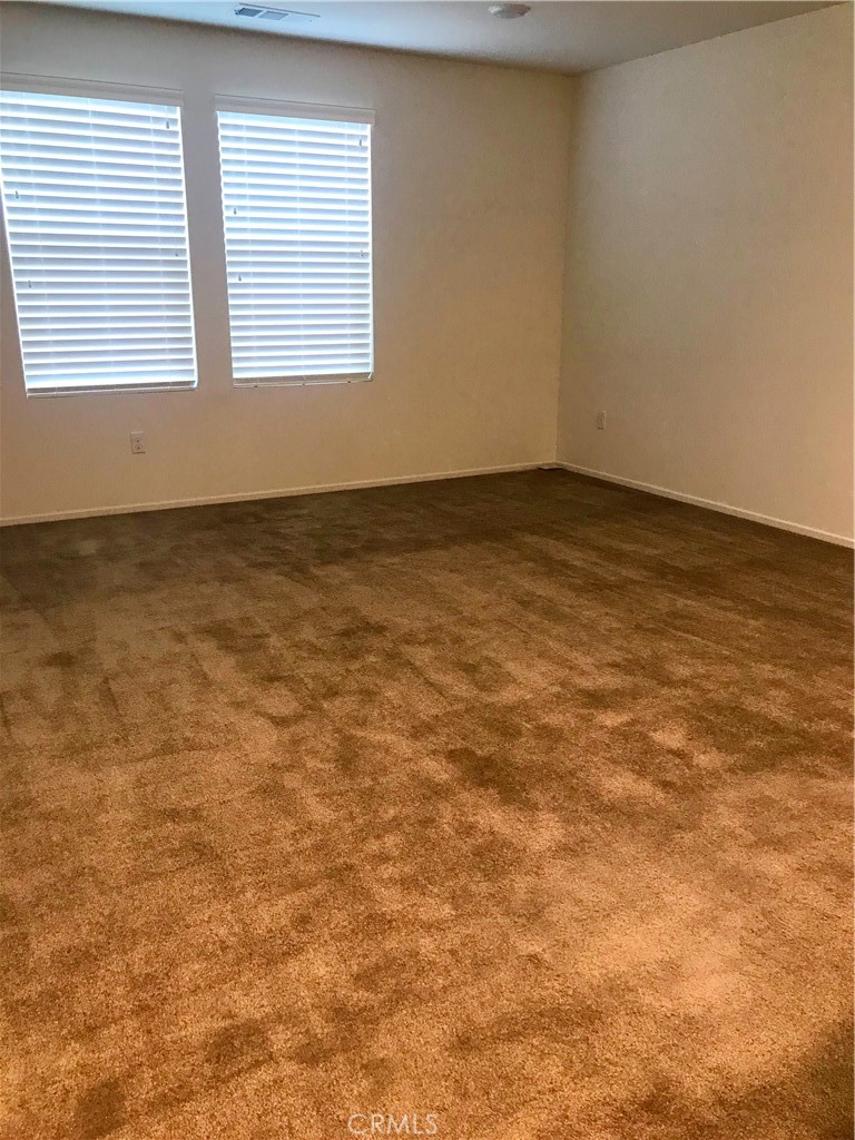 16031 Cordova Road Victorville, CA 92394 - Photo 26 of 34 an empty room with a window