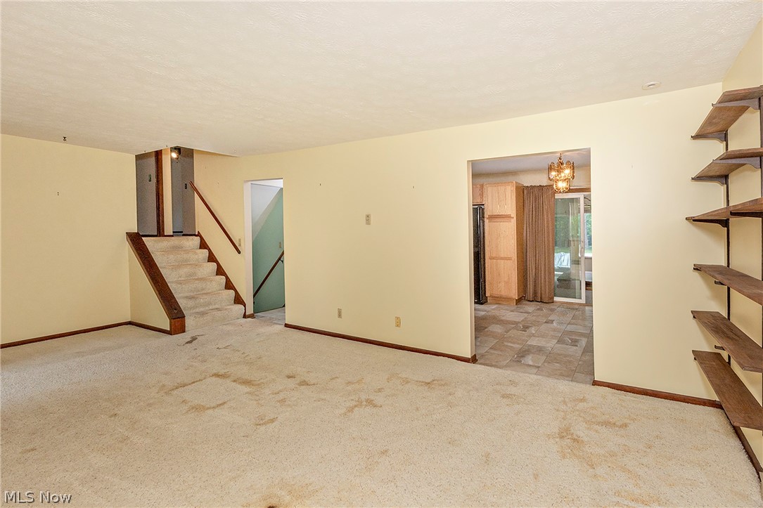 5339 East Heisley Road Mentor, OH 44060 - Photo 3 of 24 Another view of the Living Room, and stairs leading to bedrooms.
