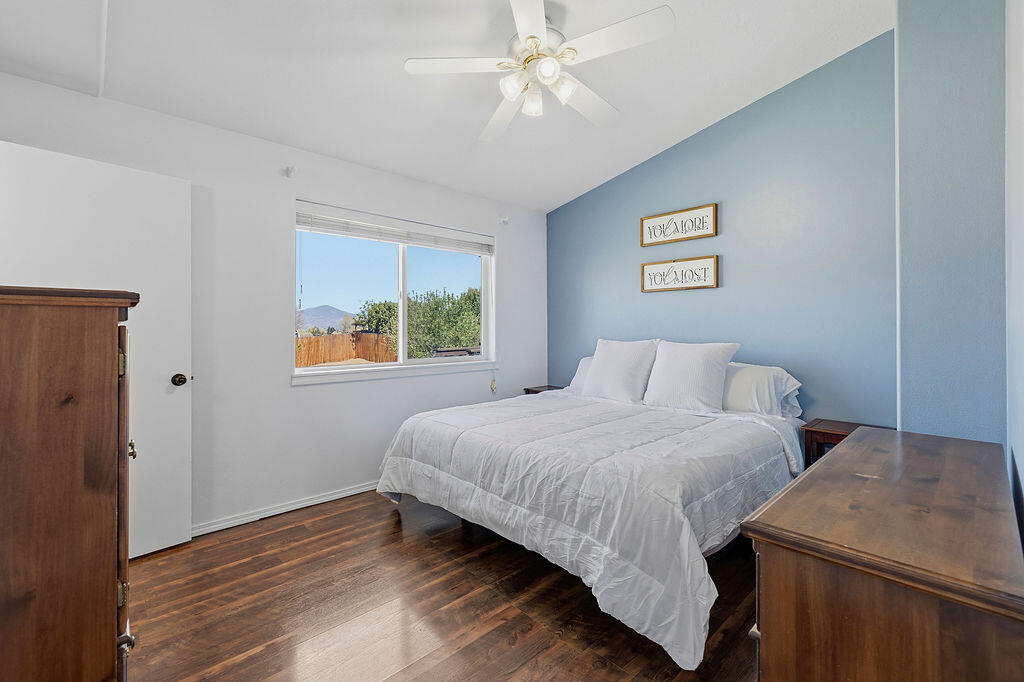 2979 Northeast Sugar Pine Road Prineville, OR 97754 - Photo 7 of 31 a bedroom with a bed and a window