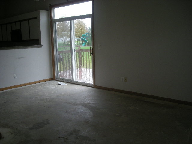1736 Raleigh Trail Romeoville, IL 60446 - Photo 7 of 7 a view of an empty room with a window