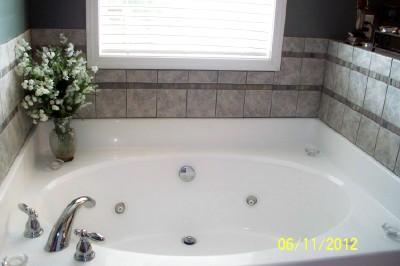 2011 Edgar Dillard Road Greenbrier, TN 37073 - Photo 11 of 17 RELAX AFTER A LONG DAY AT WORK IN THIS WONDERFUL TUB! THE SURROUNDING TILE WORK IS BEAUTIFUL! BATH ALSO HAS SEPARATE SHOWER!