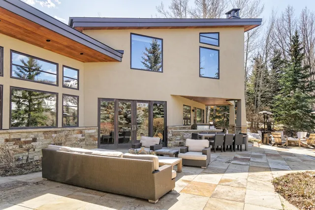 a view of swimming pool with chairs