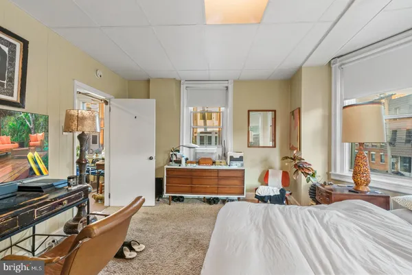 a room with furniture and a window