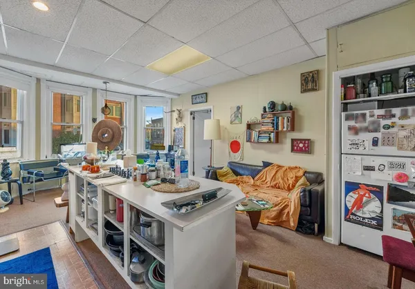 a very nice looking living room with furniture and a table