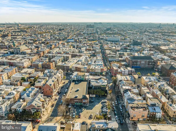 an aerial view of a city with lots of residential buildings