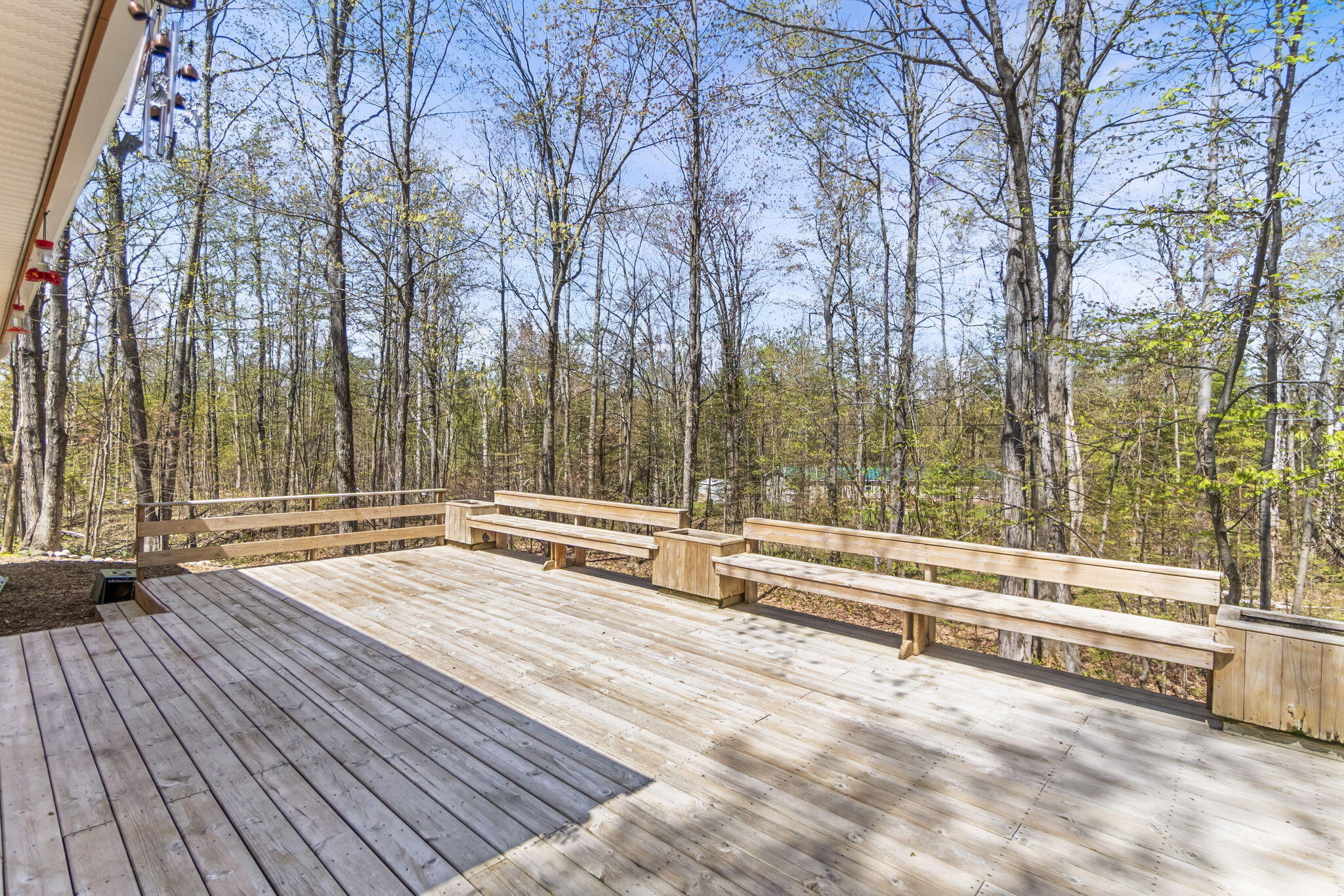 8185 Ridgeview Drive Cheboygan, MI 49721 - Photo 23 of 33 Wraparound Deck / Rear Exterior