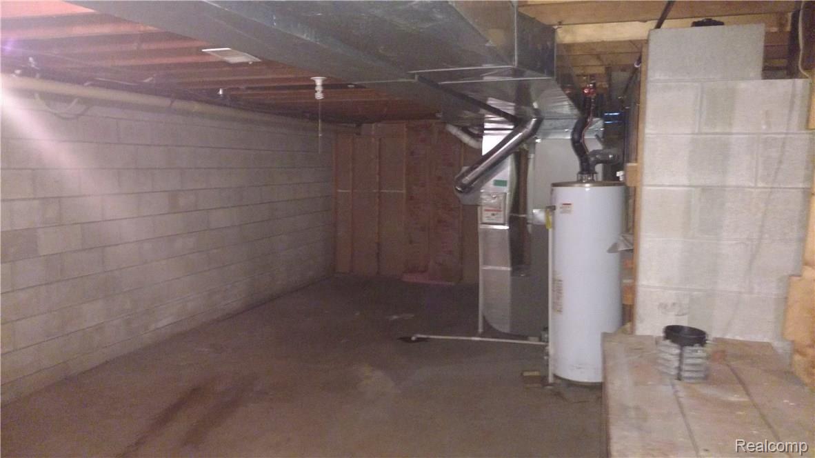 10191 Elms Road Montrose, MI 48457 - Photo 37 of 37 Tons of storage in Basement