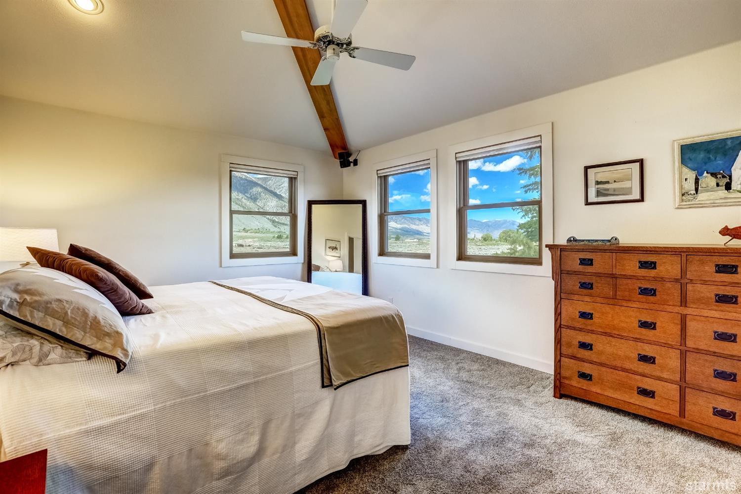 604 River Ranch Road Woodfords, CA 96120 - Photo 12 of 25 a bedroom with a bed and a dresser