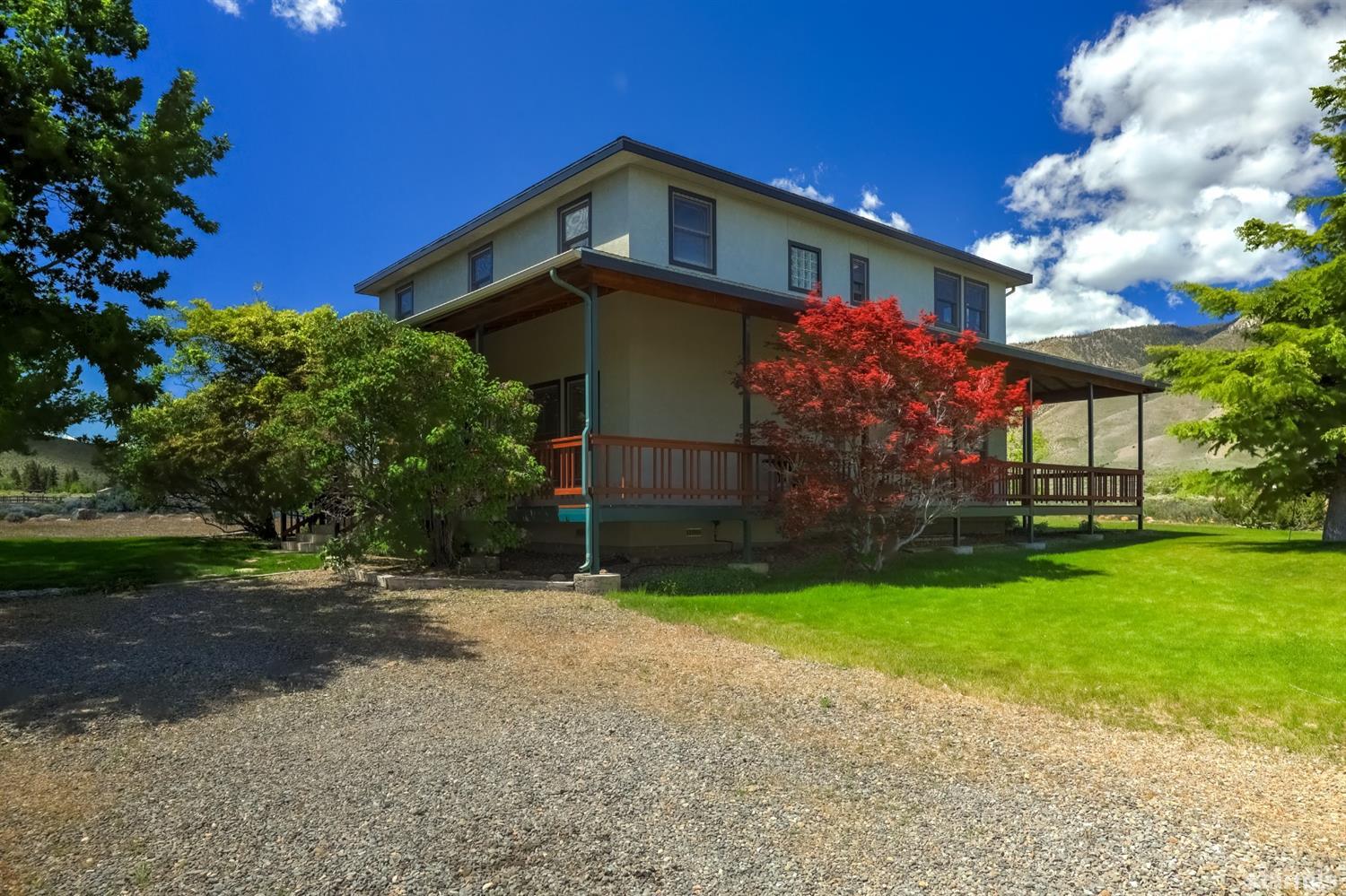 604 River Ranch Road Woodfords, CA 96120 - Photo 23 of 25 a front view of a house with garden