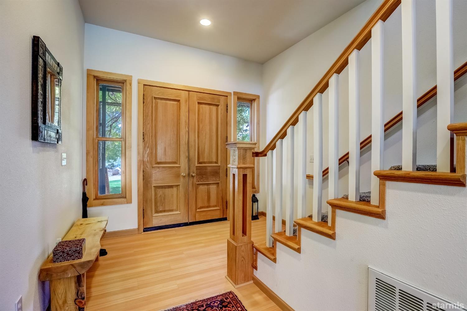 604 River Ranch Road Woodfords, CA 96120 - Photo 4 of 25 a kitchen with stainless steel appliances granite countertop a kitchen island and a stove in it